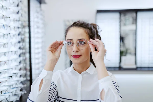 Charming Caucasian Smiling Brunette Ponytail Truing Out New Eyeglasses Optician — Stock Photo, Image