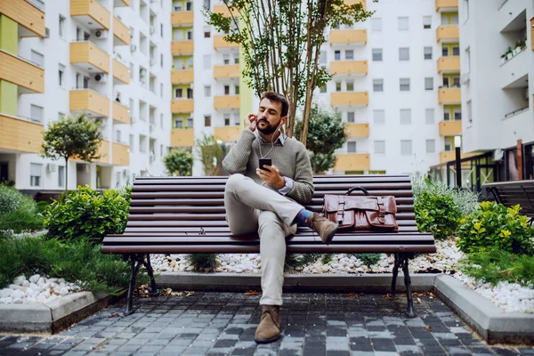 Serious Charming Caucasian Bearded Fashionable Businessman Sitting Bench Park Holding — Stock Photo, Image