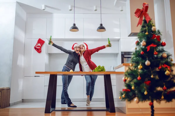 Overjoyed Senior Woman Hugging Her Daughter New Year Eve Both — ストック写真