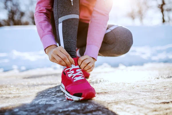 Close Caucasian Sporty Woman Crouching Outdoors Sportswear Tying Shoelace Winter — Stock Photo, Image