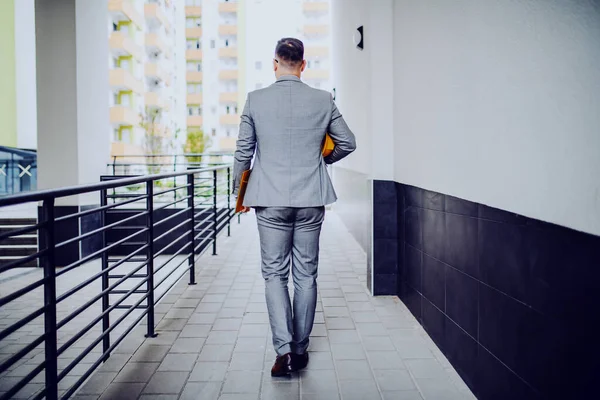 Rear View Handsome Caucasian Architect Gray Suit Helmet Folder Armpit — Stock Photo, Image