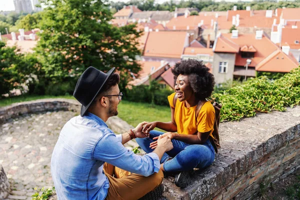 Young Happy Hipster Couple Sitting Outdoors Old Part City Holding — Stock Photo, Image