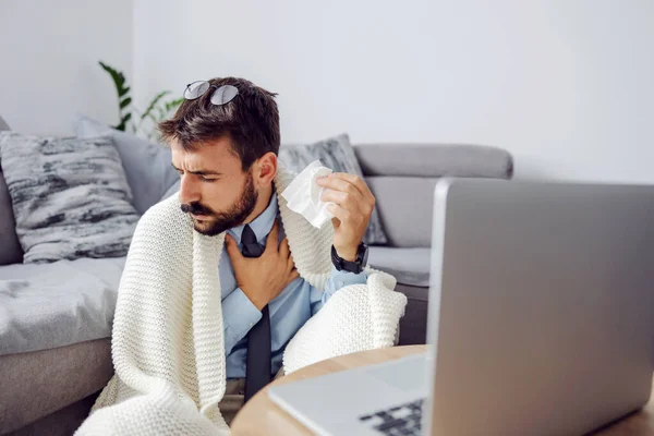 Young Ill Businessman Holding Handkerchief Coughing While Sitting Home Using — Stock Photo, Image