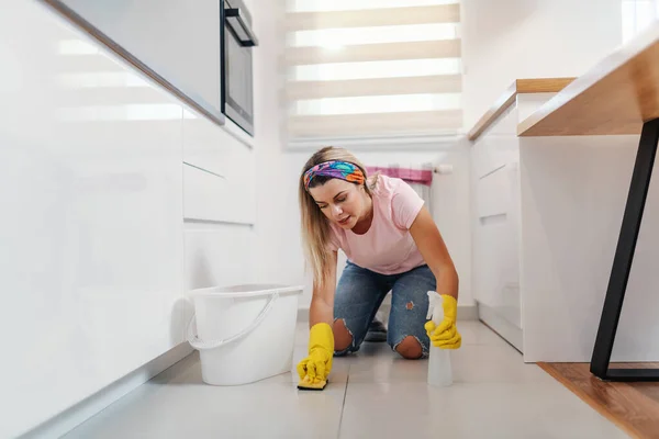 Worthy Tidy Blond Housewife Kneeling Kitchen Cleaning Floor — Stock Photo, Image