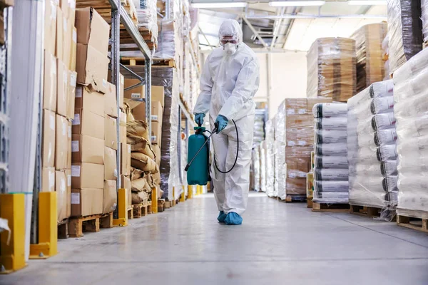 Worker Sterile Uniform Rubber Gloves Holding Sprayer Disinfectant Spraying Warehouse — Stock Photo, Image