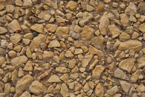 Poco Grigio Brown Minerali Rocce Sfondo. Pietre di ghiaia nella giornata di sole. Elementi decorativi sulla parete . — Foto Stock