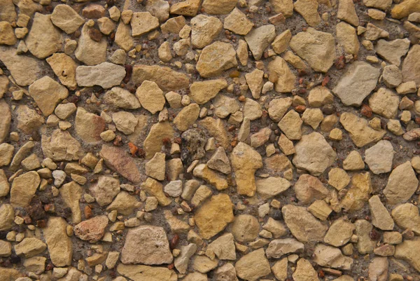 Poco Grigio Brown Minerali Rocce Sfondo. Pietre di ghiaia nella giornata di sole. Elementi decorativi sulla parete . — Foto Stock