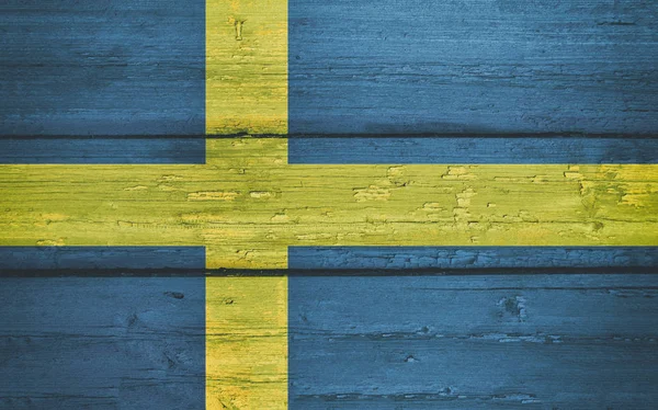 Bright Sweden National Flag on a Wooden Background.  Grunge Flags Texture. — Stock Photo, Image