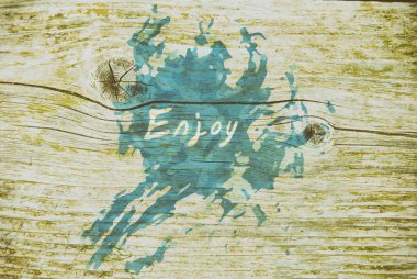 Ahşap arka plan mavi dalga kelime Enjoy görüntü. Okyanus sulu boya doku