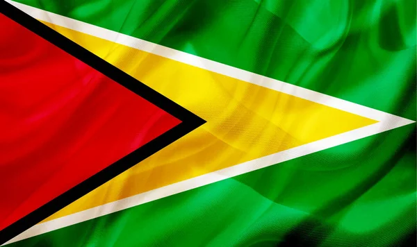 Guyana country flag on silk or silky waving texture — Stock Photo, Image