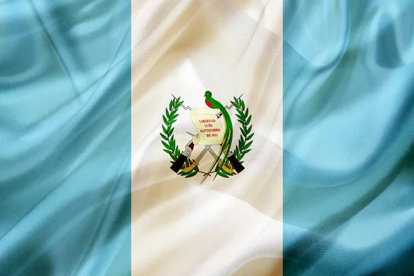 Guatemala land flagga på siden eller silkeslen viftande textur — Stockfoto