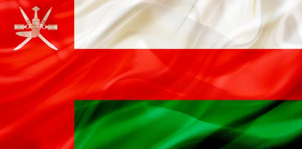 Flaga kraju Oman na jedwabiu lub jedwabiste machając tekstury — Zdjęcie stockowe