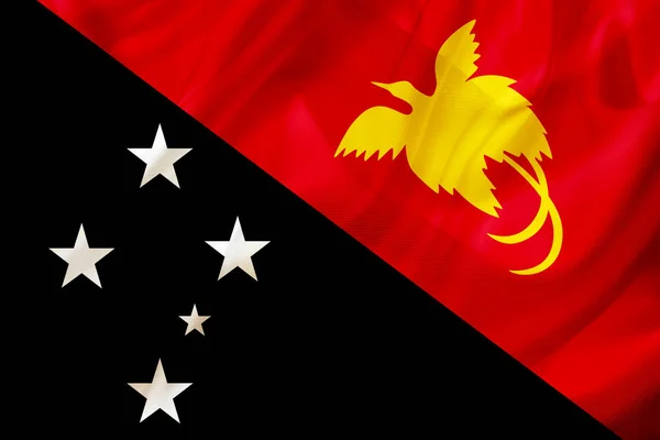 Papua New Guinea country flag on silk or silky waving texture — Stock Photo, Image