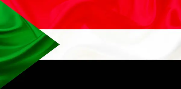 Sudão bandeira do país em seda ou textura ondulada sedosa — Fotografia de Stock