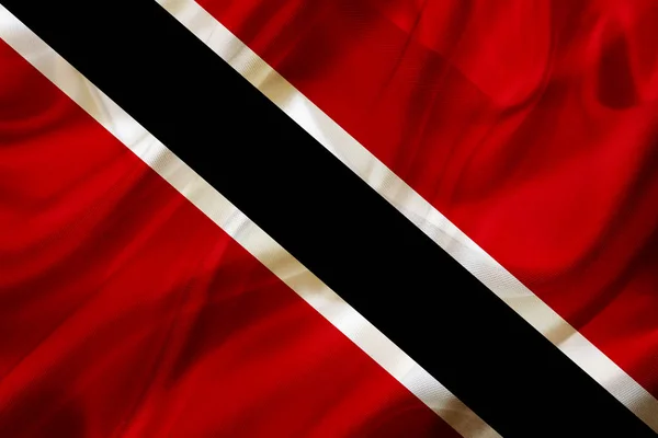 Trinidad and Tobago country flag on silk or silky waving texture — Stock Photo, Image