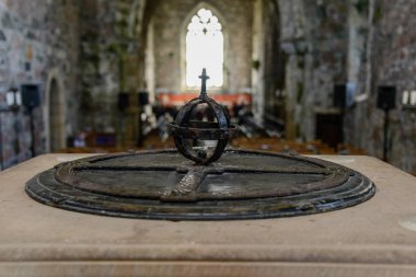 Interior sculptures of medieval Iona abbey on Isle of Iona, Scotland, Great Britain clipart