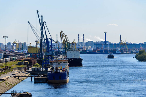 Saint-Petersburg sea port with vessel moored