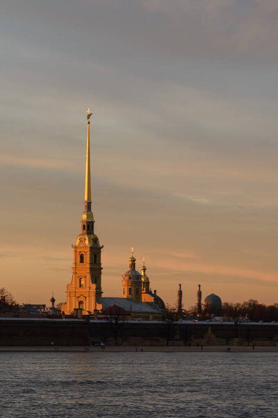Saints Peter and Paul Cathedral of fortress at sunset in Saint Petersburg, Russia