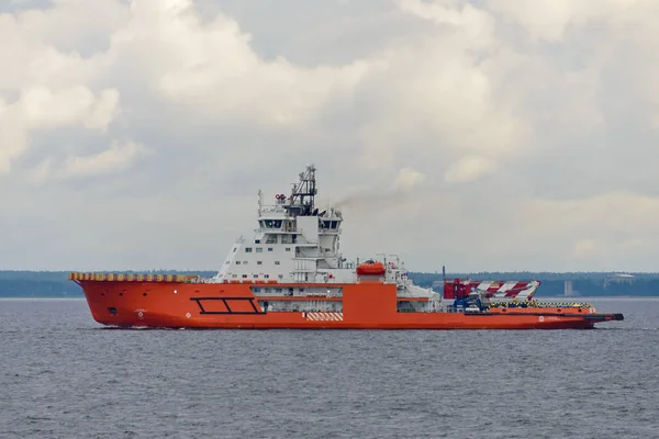 Orange research vessel at sea