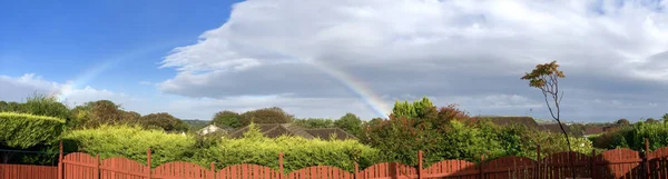 Rainbow over Onchan after a passing storm, Isle of Man