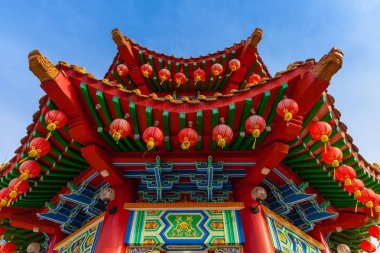 The roof of the Thean Hou Temple decorated with red Chinese lanterns, Kuala Lumpur, Malaysia clipart