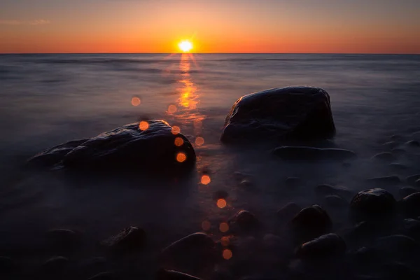 sea stones in beautiful sunset light