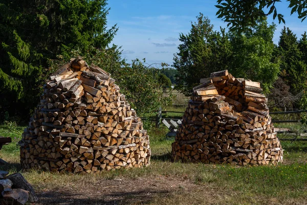 Piles of chopped firewood outdoors — Stock Image Piles Chopped Firewood Outdoors Royalty Free Stock Images