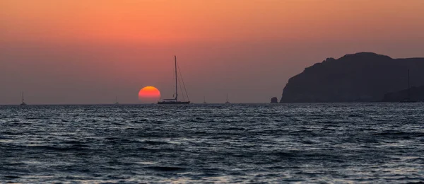 The sunset is reflected on the Beach of Masua, Iglesias