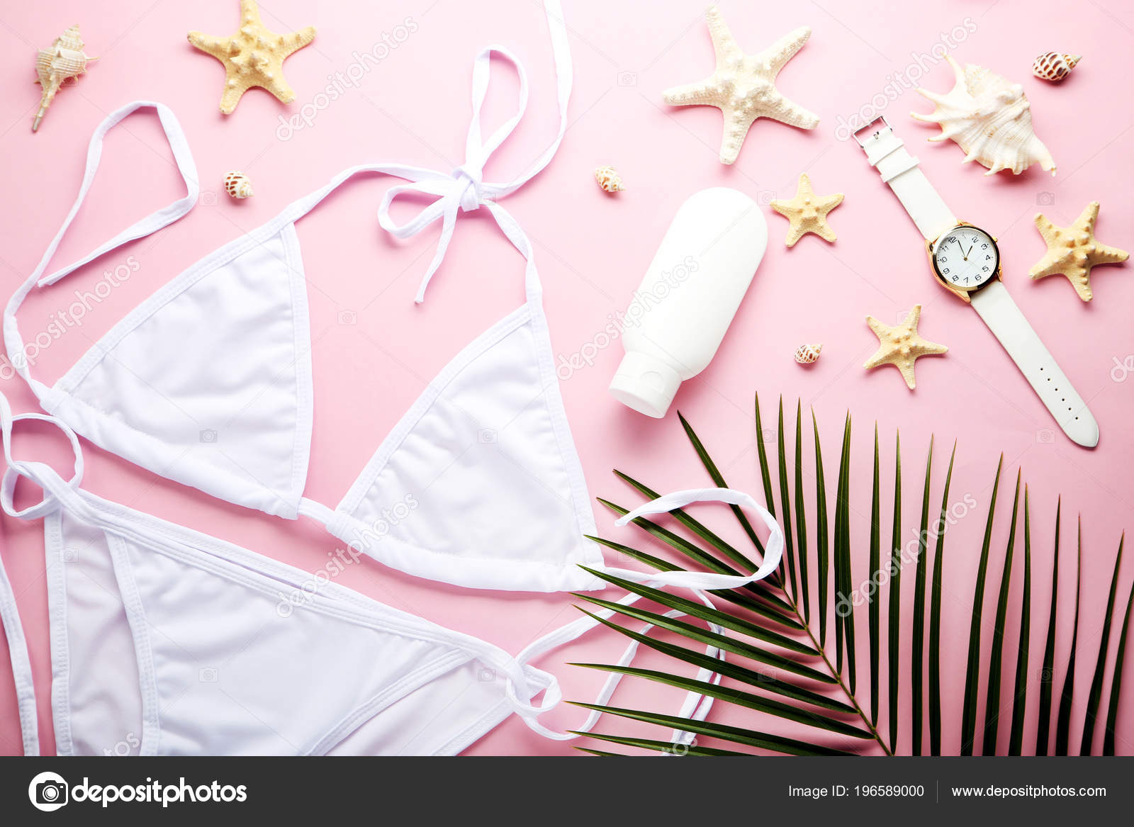 pink swimsuit with palm leaves