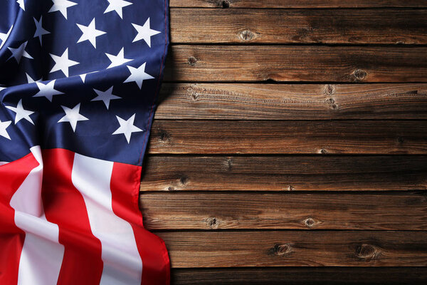 American flag on brown wooden table
