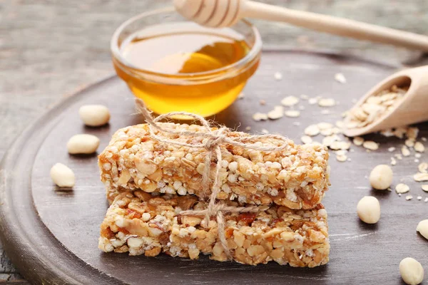 Tasty Granola Bars Nuts Honey Bowl Wooden Table — Stock Photo, Image