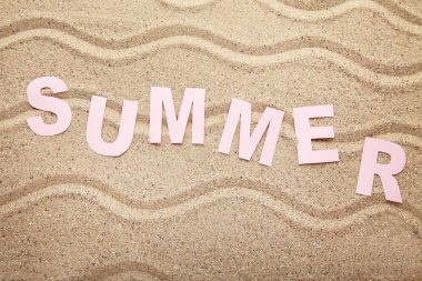 Plaj kum üzerinde yazıt yaz