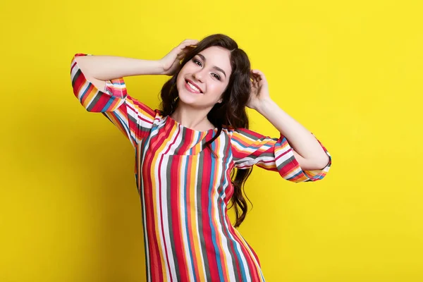 Young Woman Striped Dress Yellow Background — Stock Photo, Image