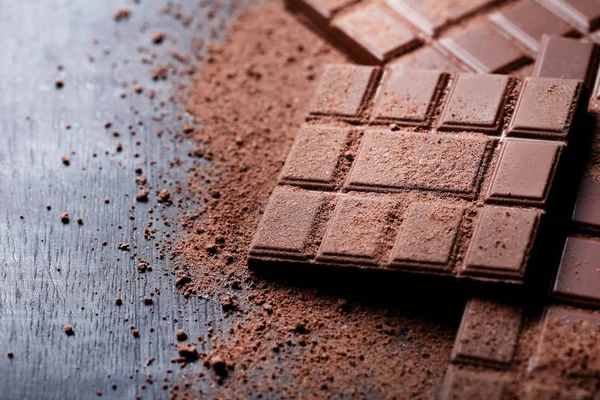Barras Chocolate Con Cacao Polvo Sobre Mesa Madera —  Fotos de Stock