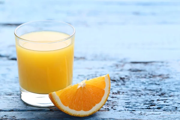 Orange Slice Glass Juice Blue Wooden Table — Stock Photo, Image