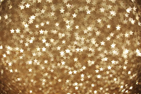 Brillante Estrella Dorada Fondo Bokeh —  Fotos de Stock