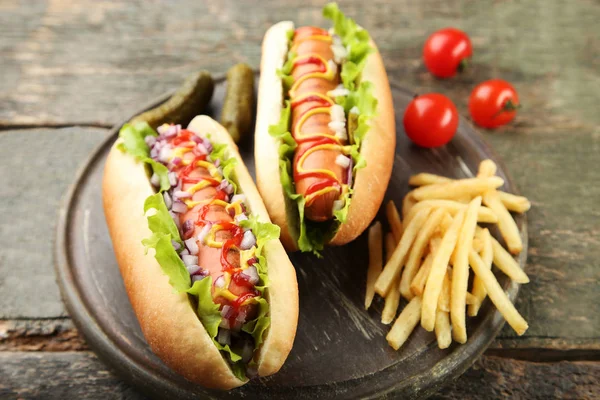 Hot Dogs Vegetables French Fries Wooden Table — Stock Photo, Image