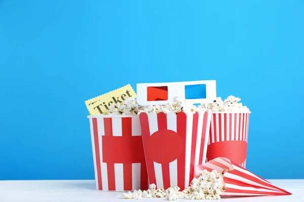 Popcorn Striped Buckets Glasses Blue Background — Stock Photo, Image