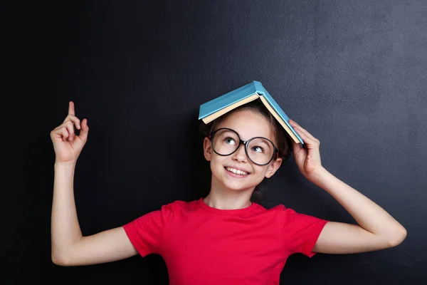 Young Girl Book Glasses Blackboard Background — Stock Photo, Image
