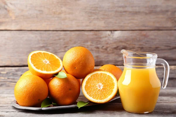 Orange Fruits Tray Jug Juice Grey Wooden Table — Stock Photo, Image