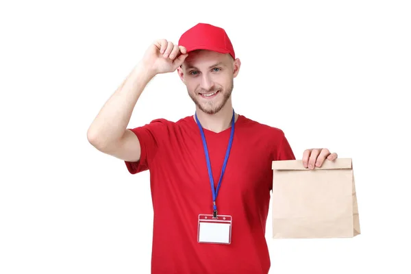 Entrega Homem Uniforme Vermelho Com Saco Papel Fundo Branco — Fotografia de Stock