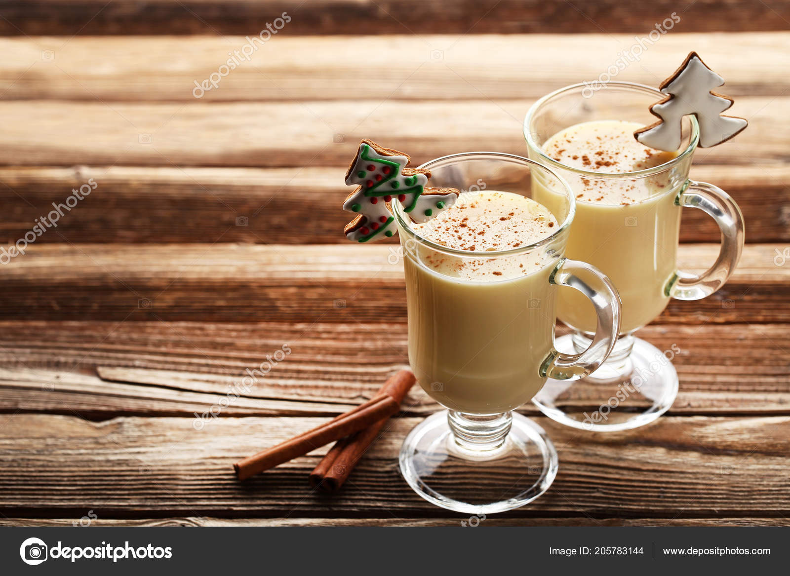 Eggnog Glasses Cinnamon Wooden Table Stock Photo by ©5seconds