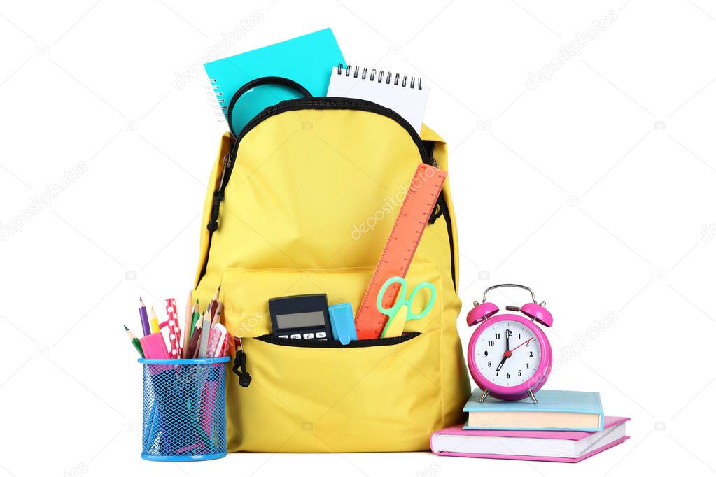 Yellow backpack with school supplies on white background
