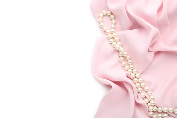 Collar Perlas Con Tela Satén Rosa Sobre Fondo Blanco —  Fotos de Stock
