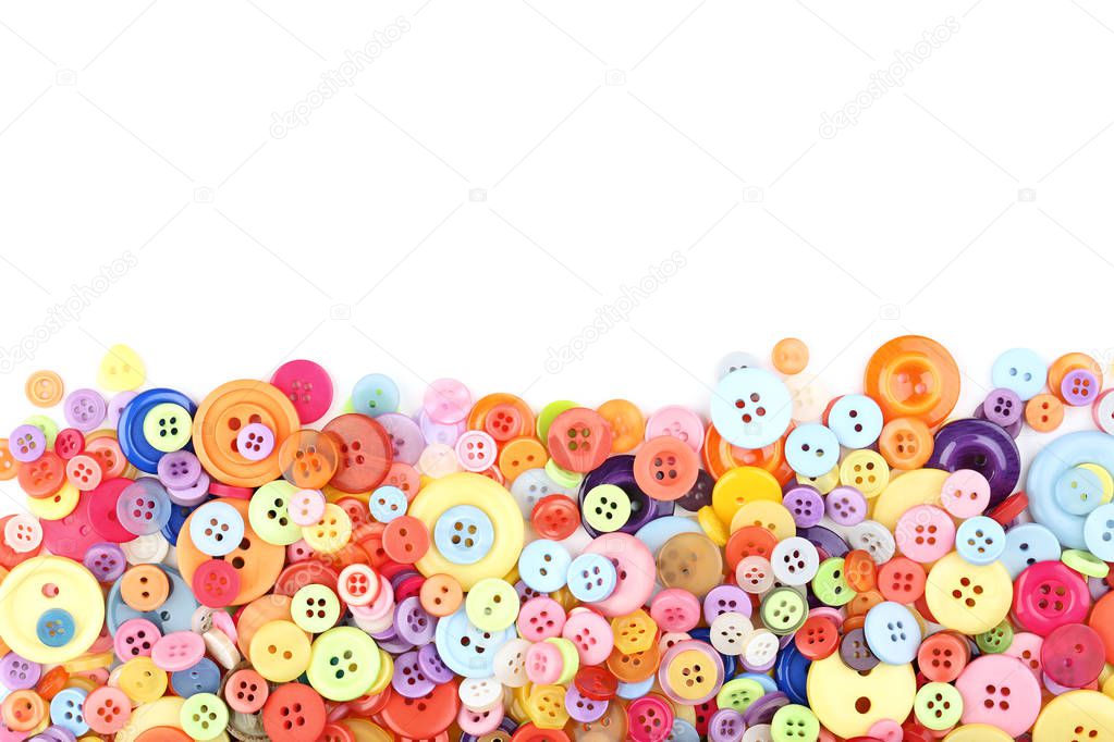 Colorful sewing buttons on white background