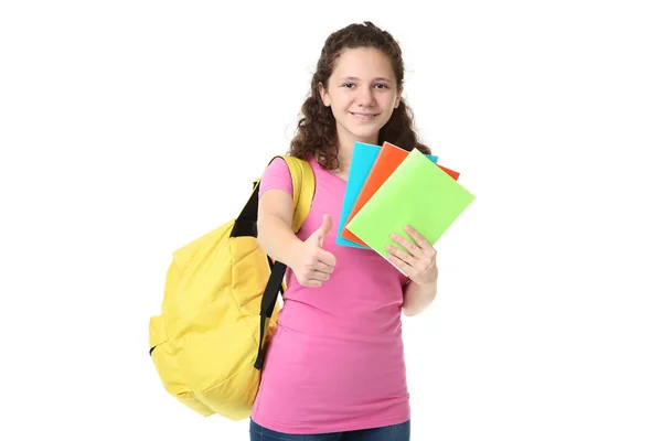 Carino Ragazza Con Zaino Quaderni Mostrando Pollice Mentre Posa Isolato — Foto Stock