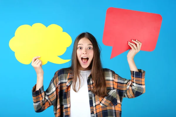 Young Girl Holding Cardboard Speech Bubbles Blue Background — Stock Photo, Image