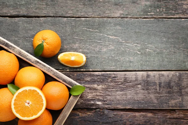 Orange Fruit Green Leafs Crate Grey Wooden Table — Stock Photo, Image