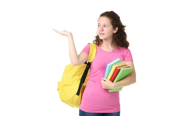 Junges Mädchen Mit Rucksack Und Büchern Auf Weißem Hintergrund — Stockfoto