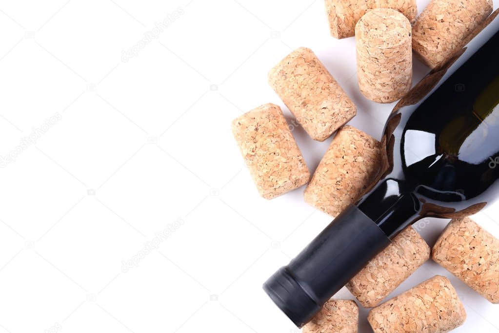 Wine bottle with corks on white background